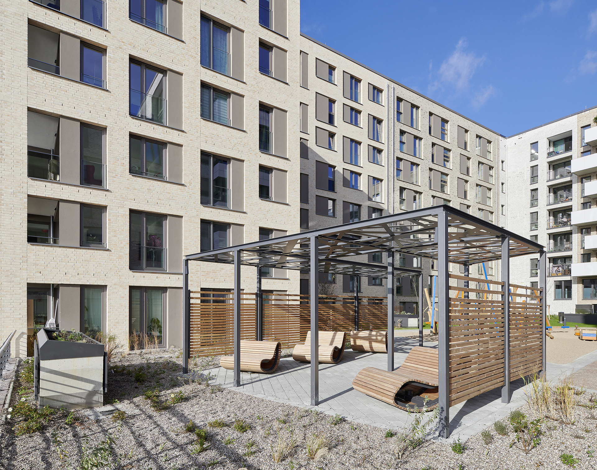 Wohnungsbau; Baakenallee; Hafencity; Schiffszimmerer Genossenschaft; Hafen; Elbe; Spielplatz; Innenhof; Hamburg; Neubau; Architekturfotografie; Markus Tollhopf; Fotografie; Stadtentwicklung; Aussenaufnahme