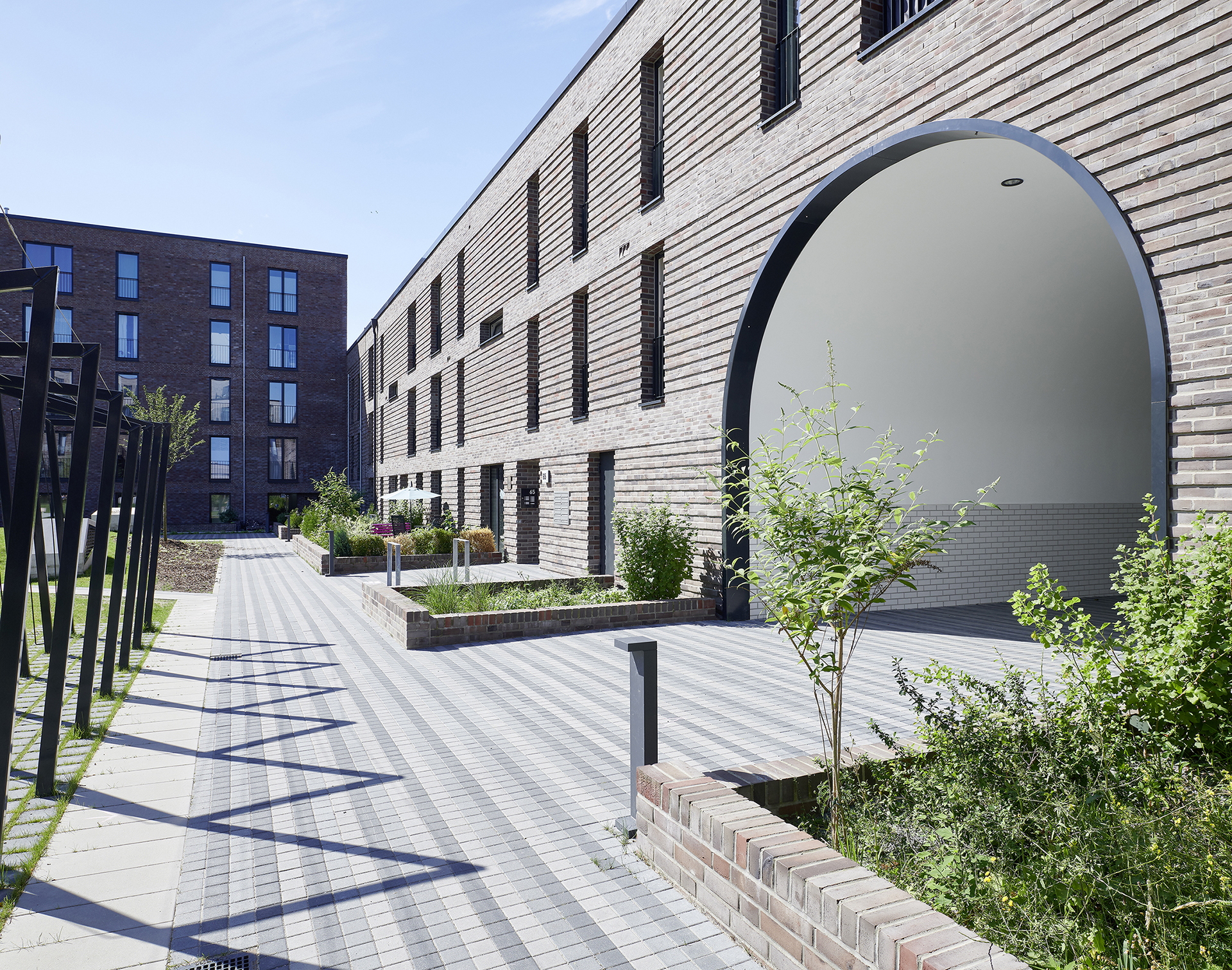 Wohnungsbau; Pergolenviertel; Winterlindenweg; Hafencity; Schiffszimmerer Genossenschaft; Innenhof; Hamburg; Neubau; Architekturfotografie; Markus Tollhopf; Fotografie; Stadtentwicklung; Aussenaufnahme