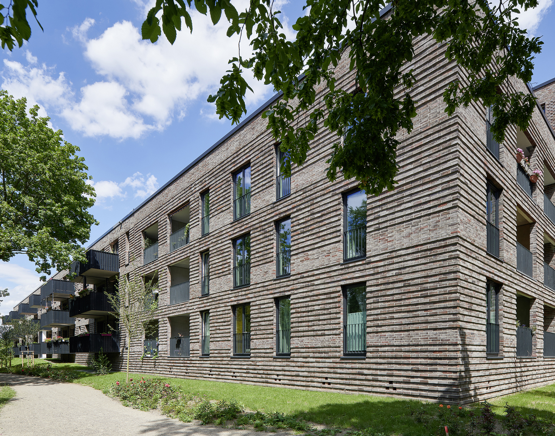 Wohnungsbau; Pergolenviertel; Winterlindenweg; Hafencity; Schiffszimmerer Genossenschaft; Innenhof; Hamburg; Neubau; Architekturfotografie; Markus Tollhopf; Fotografie; Stadtentwicklung; Aussenaufnahme
